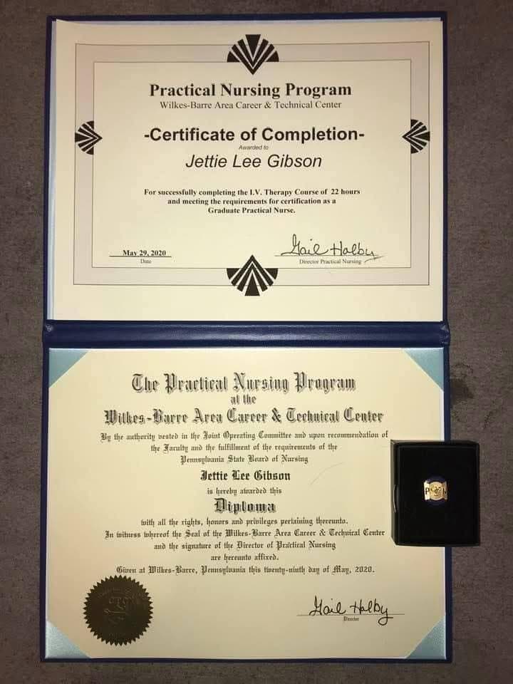 Photograph of two documents from the Practical Nursing Program at the Wilkes-Barre Area Career and Technical Center, both awarded to Jettie Lee Gibson and dated May 2020: a certificate of completion for the 22 hour I.V. Therapy Course, and the program diploma.